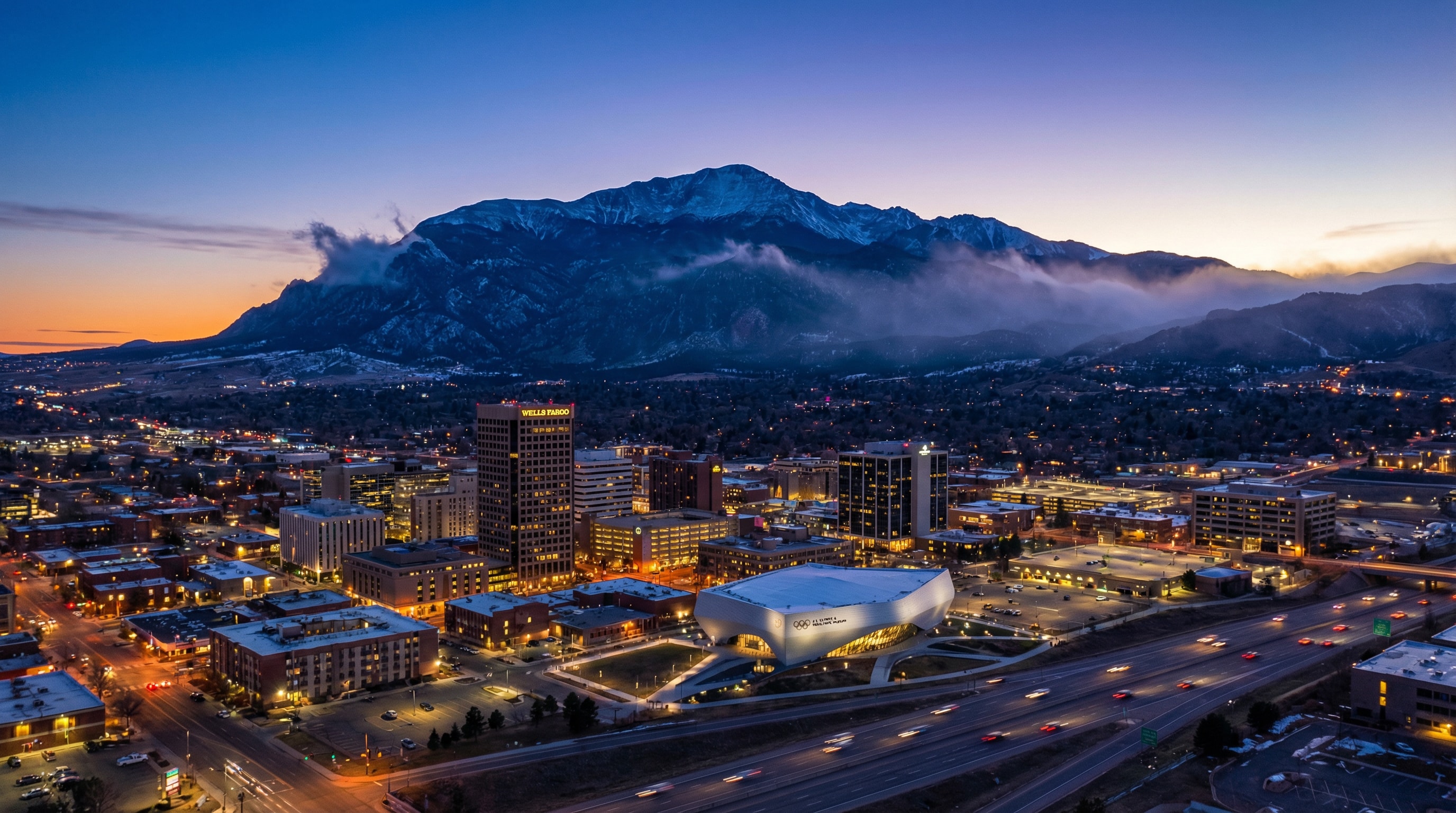 Colorado Springs skyline with Pikes Peak - We buy houses in Colorado Springs CO
